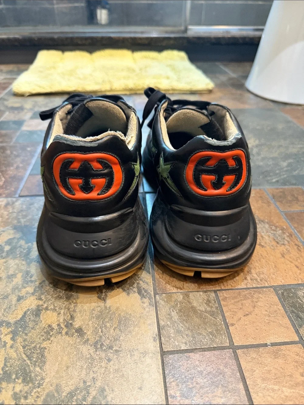 Black Leather Gucci Sneakers with Green Star Accents